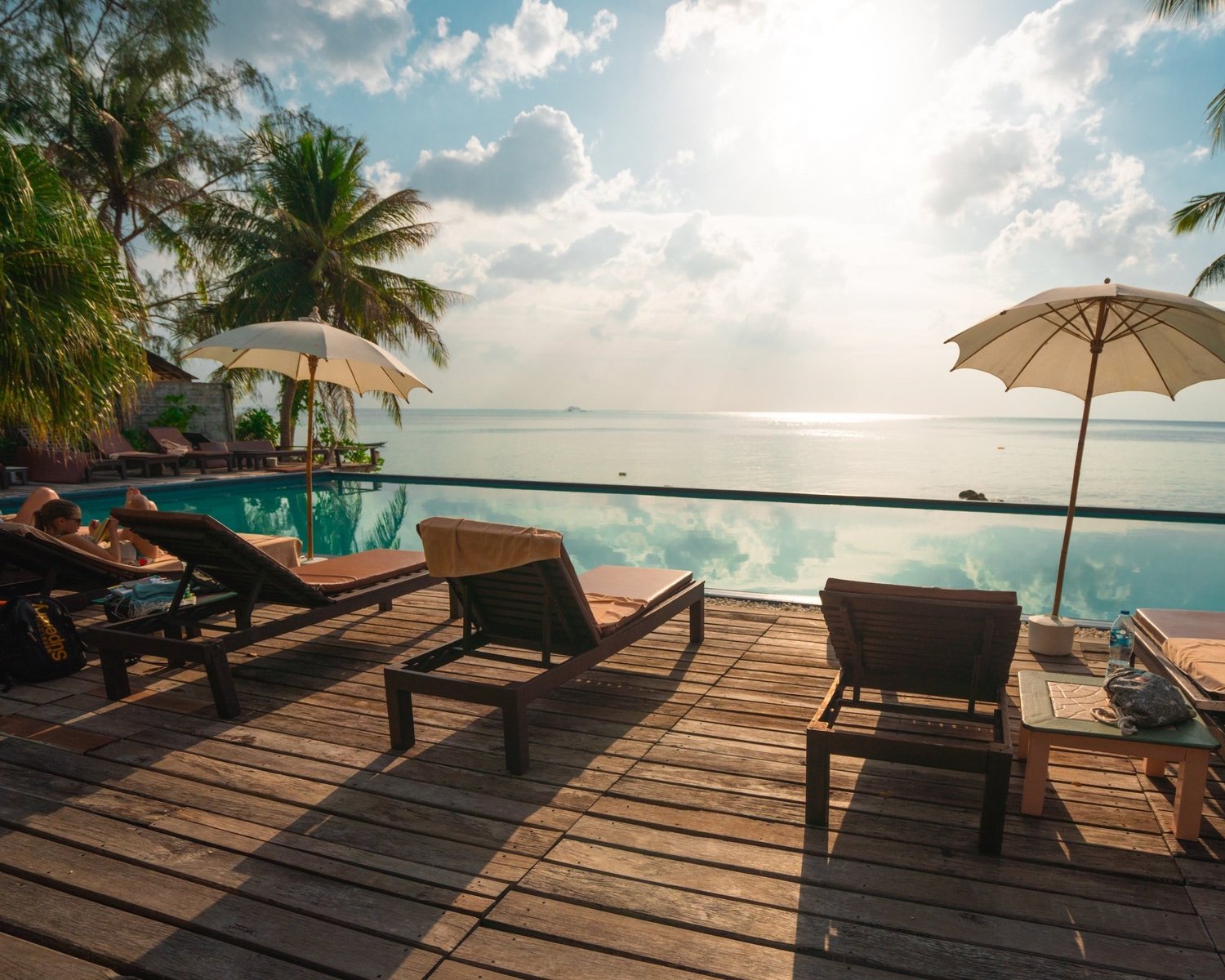 Resort pool deck at sunset